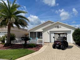 Modern charm meets vibrant living with outdoor oasis and golf cart fun!