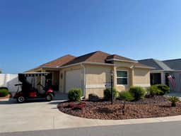 Stylish villa with golf cart, BBQ, near pool & shops in tranquil setting!