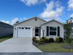 Charming home w/spacious kitchen, water view, enclosed lanai, & Pet Friendly