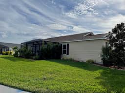 Cozy and Charming 3/2 Corner lot charm w/4-seater golf cart & BBQ grill.