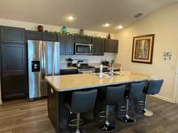 Cozy and Charming 3/2 Corner lot charm w/4-seater golf cart & BBQ grill.