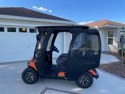 Modern elegance meets Florida charm in this stunning home with golf cart!