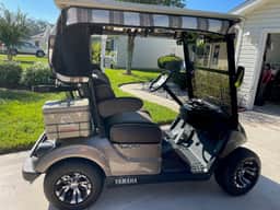 Cozy home w/golf cart, lanai, smart TVs, & prime location near town squares!