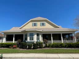 Charming cottage w/a wrap-around porch & golf cart—perfect for relaxation!