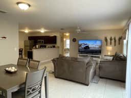 Stylish Home in Duval w/Granite, Tile Floors, Glass Lanai & Gas Golf Cart!