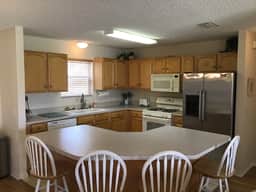 Charming 3/2 Home Close to Shopping w/Golf Cart, BBQ Grill, & FREE WiFi!!