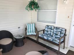 This home has it all! Golf Cart, BBQ Grill & Close to Recreation!!