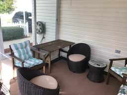 This home has it all! Golf Cart, BBQ Grill & Close to Recreation!!