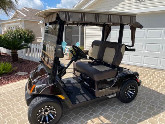 Modern charm meets vibrant living with outdoor oasis and golf cart fun!