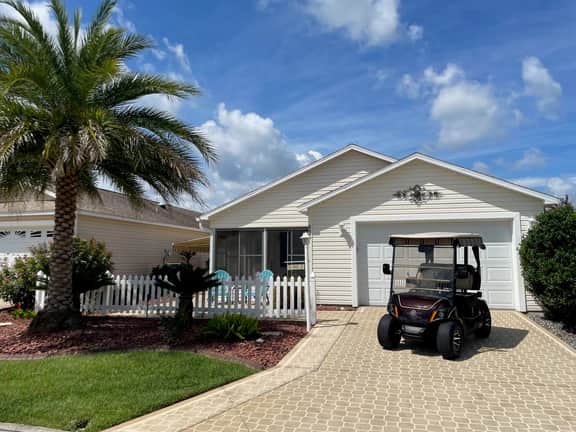 Modern charm meets vibrant living with outdoor oasis and golf cart fun!