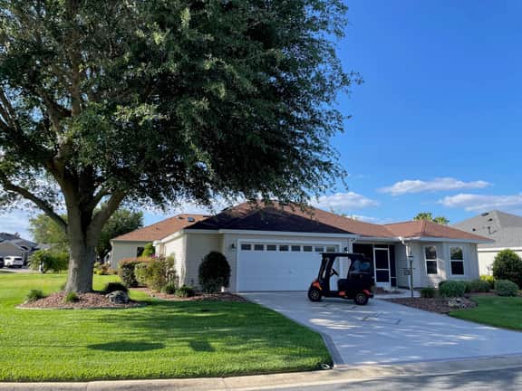 Modern elegance meets Florida charm in this stunning home with golf cart!