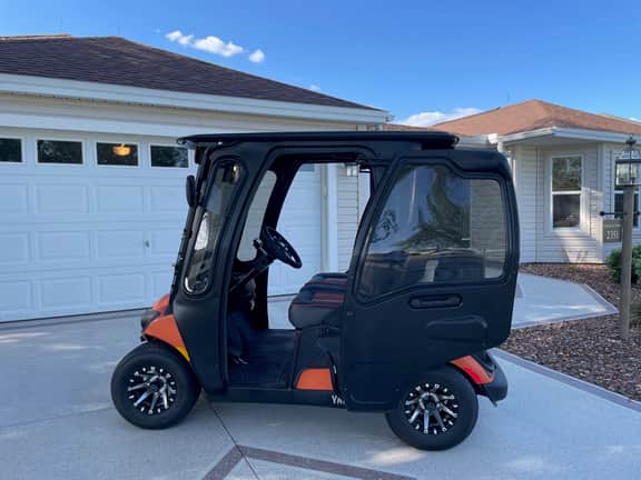 Modern elegance meets Florida charm in this stunning home with golf cart!