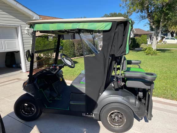 Cozy home w/golf cart, lanai, smart TVs, & prime location near town squares!