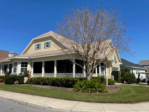 Charming cottage w/a wrap-around porch & golf cart—perfect for relaxation!
