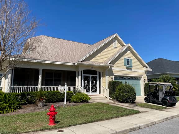 Charming cottage w/a wrap-around porch & golf cart—perfect for relaxation!