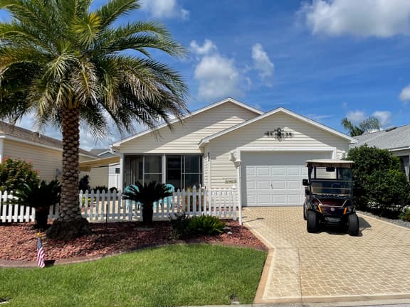 Modern charm meets vibrant living with outdoor oasis and golf cart fun!