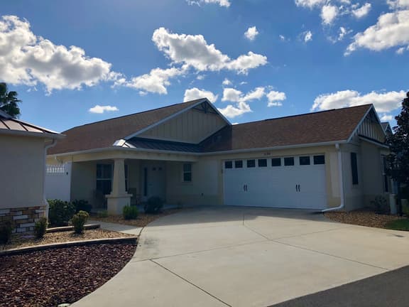 Spectacular Home with a Gas Golf Cart & Located just off Lake Sumter Landing!