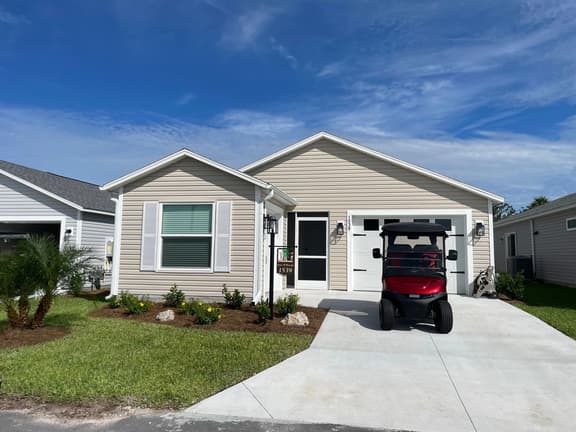 Golf & water views meet fresh style in this brand-new Florida retreat!