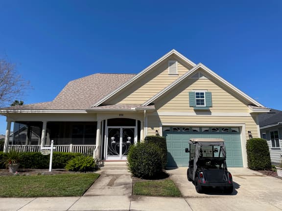 Charming cottage w/a wrap-around porch & golf cart—perfect for relaxation!