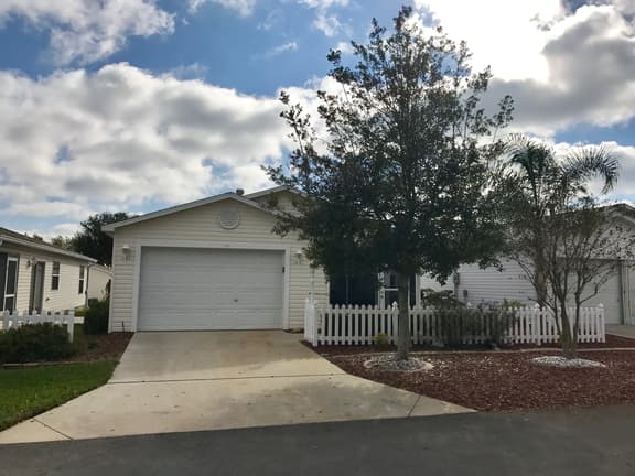 This home has it all! Golf Cart, BBQ Grill & Close to Recreation!!